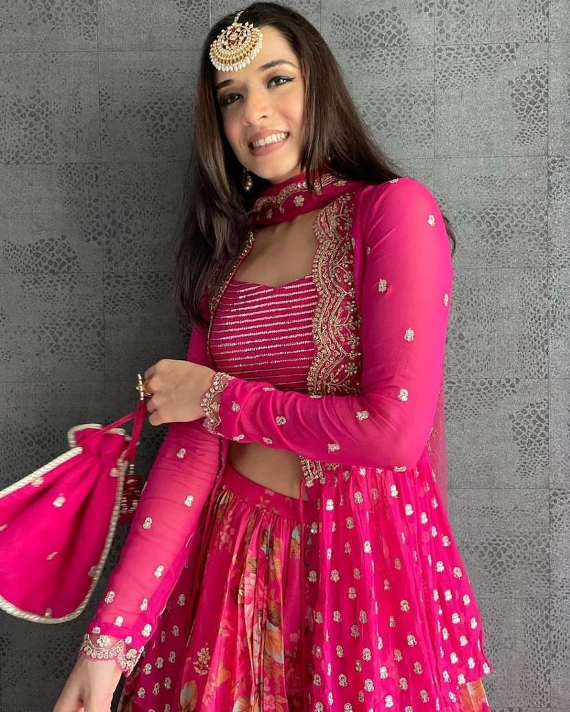 Vibrant pink floral-printed georgette lehenga choli paired with a matching sheer embroidered jacket