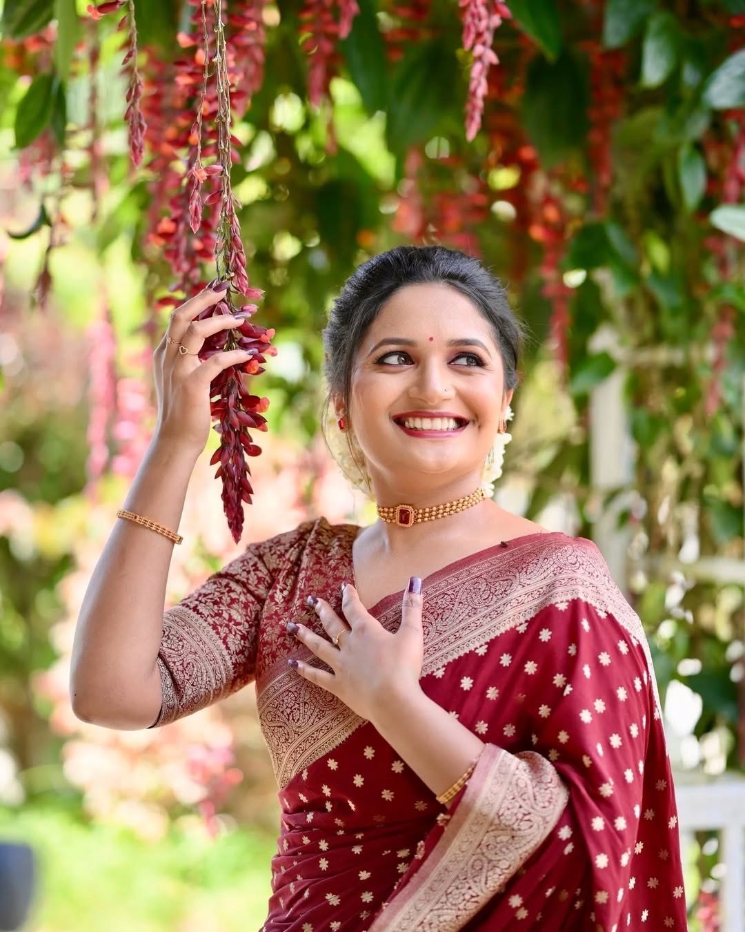 Red banarasi soft silk saree with vel design blouse piece
