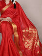 Dressing up for Onam in a raw silk saree that reflects the beauty of Kerala traditions and celebrations.
