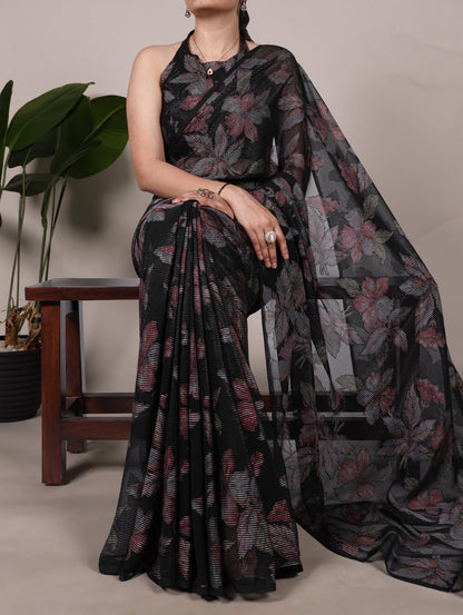 This floral Lurex Brasso saree blends the charm of blooming prints with the luxury of subtle shine 🍁