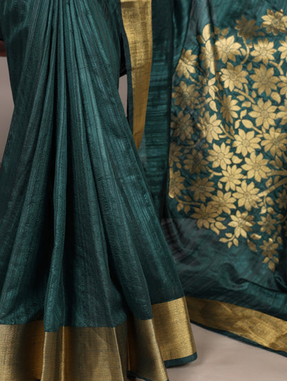 Dressing up for Onam in a raw silk saree that reflects the beauty of Kerala traditions and celebrations.