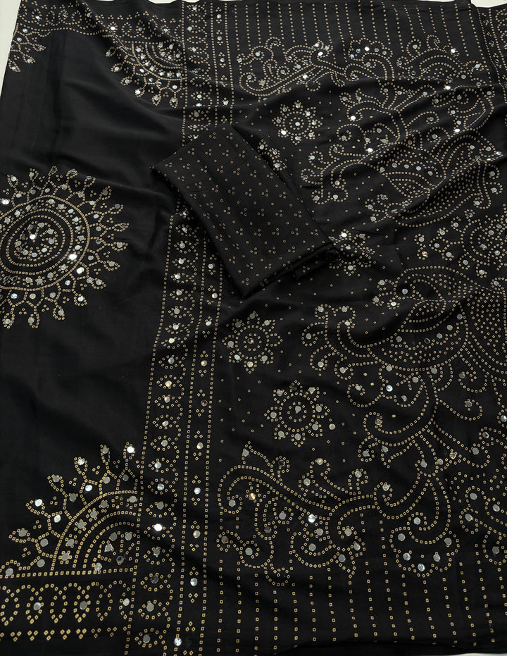 Black saree embellished with traditional Bandhani and circular motif prints and Real mirror Work