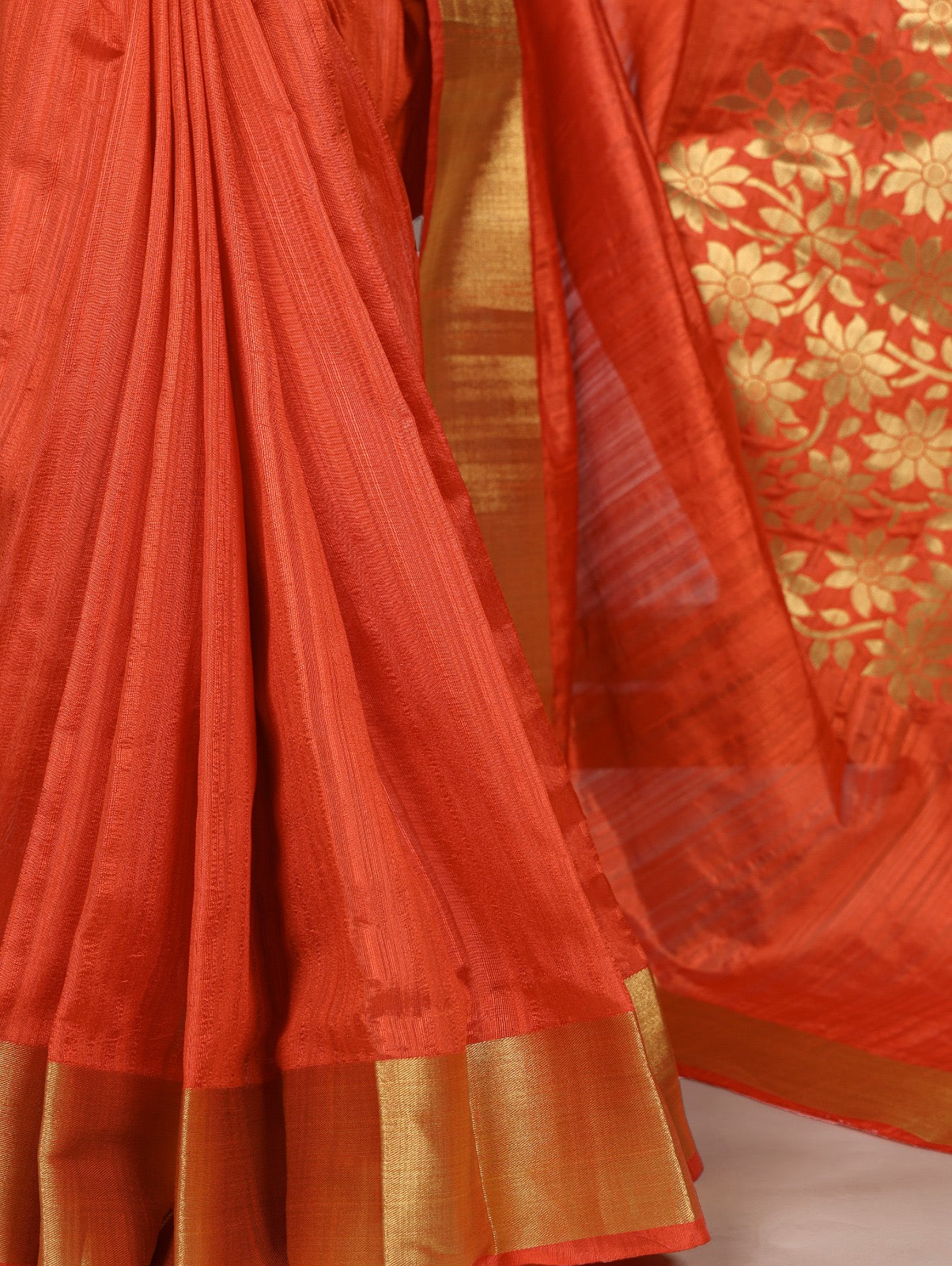 Dressing up for Onam in a raw silk saree that reflects the beauty of Kerala traditions and celebrations.