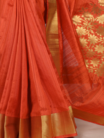 Dressing up for Onam in a raw silk saree that reflects the beauty of Kerala traditions and celebrations.