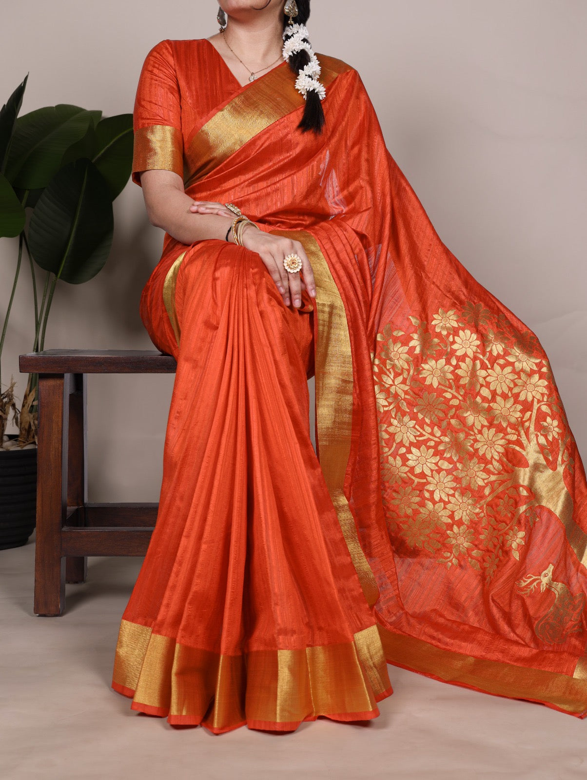 Dressing up for Onam in a raw silk saree that reflects the beauty of Kerala traditions and celebrations.