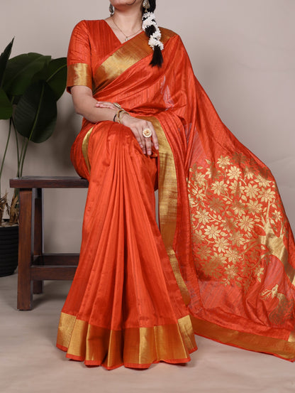 Dressing up for Onam in a raw silk saree that reflects the beauty of Kerala traditions and celebrations.
