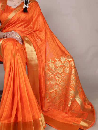 Dressing up for Onam in a raw silk saree that reflects the beauty of Kerala traditions and celebrations.