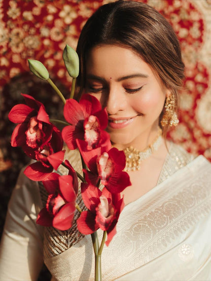 Diva of white banarasi silk saree