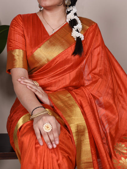 Dressing up for Onam in a raw silk saree that reflects the beauty of Kerala traditions and celebrations.