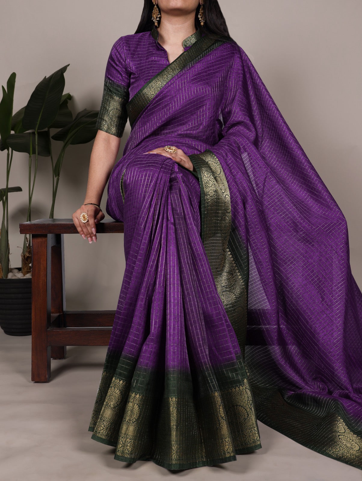 Traditional beauty highlighted with zari borders and classic checks 🍂