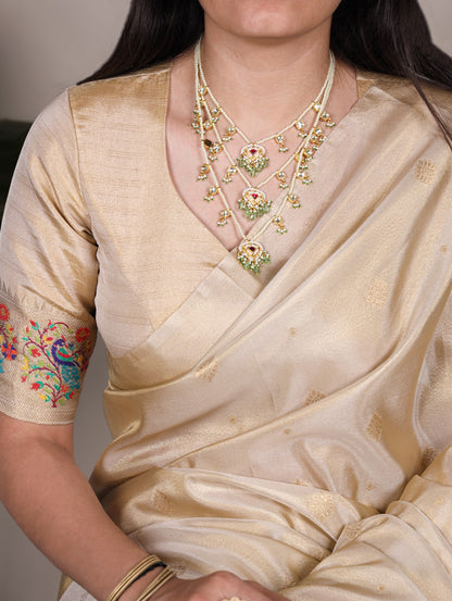 Perfect for pujas, and celebrations – this tissue silk saree drapes like a dream and dazzles like gold ✨